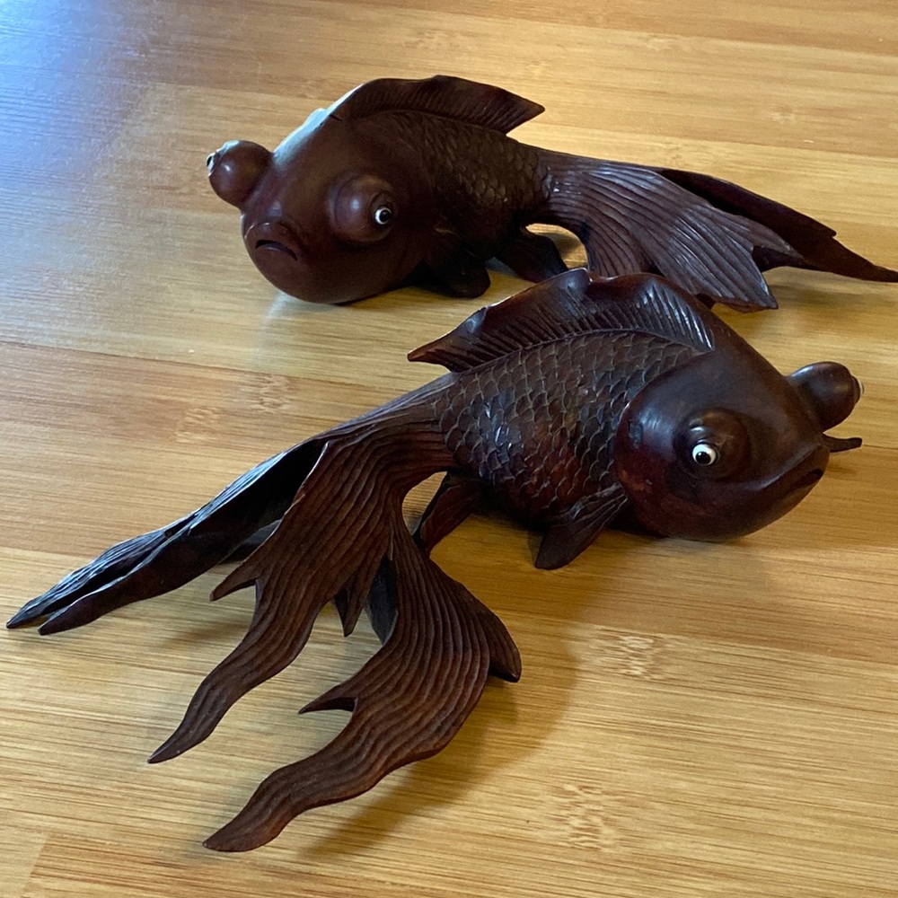 Two Vintage Hand Carved Wooden Fish Sculptures with Glass Eyes